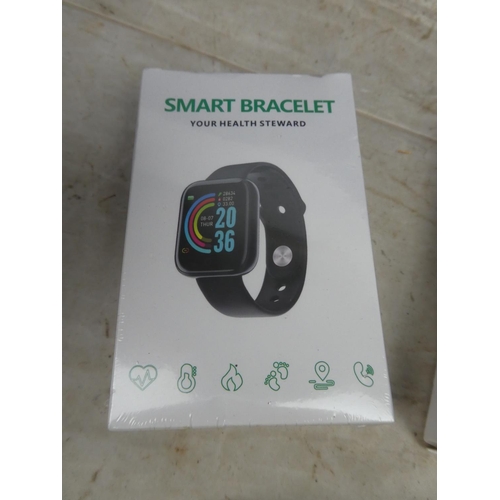 167 - A boxed Smart watch face and bracelet.