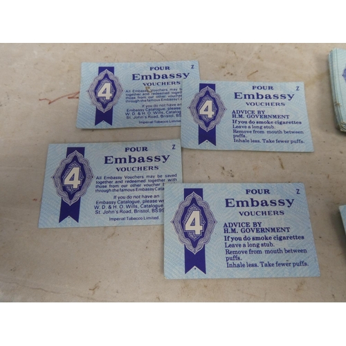 171 - A large lot of vintage Embassy cigarette vouchers.