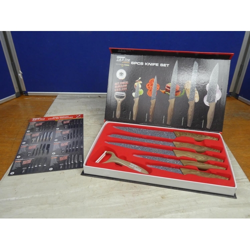 174 - A boxed Zep Line knife set.