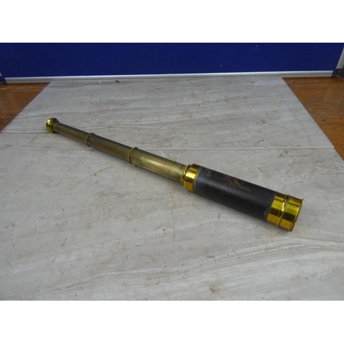 181 - A 3 draw brass and leather bound telescope.