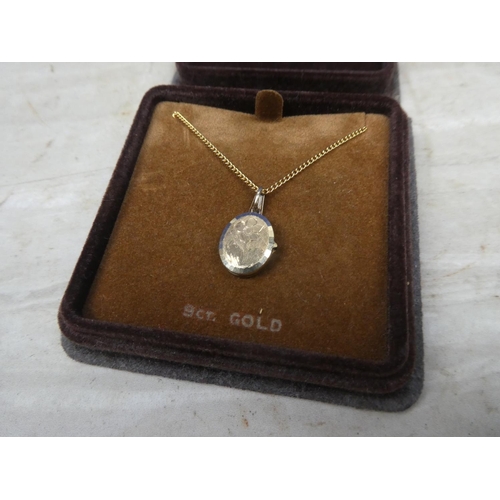 184 - A 9ct gold plated locket.