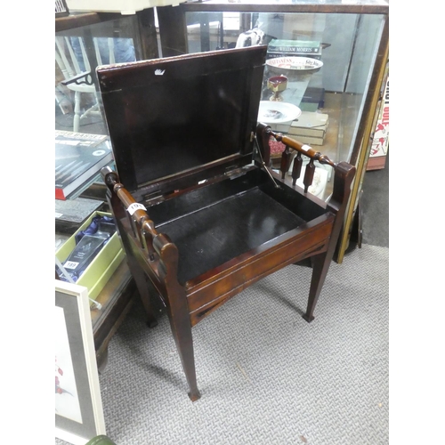 191 - A vintage piano stool.  Approx 50x62x34cm.