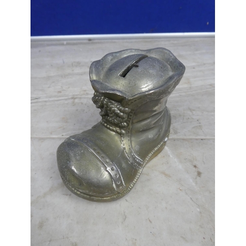 196 - A metal 'boot' money box.