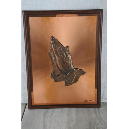 203 - A religious copper picture signed Magowan.  Approx 32x24cm.