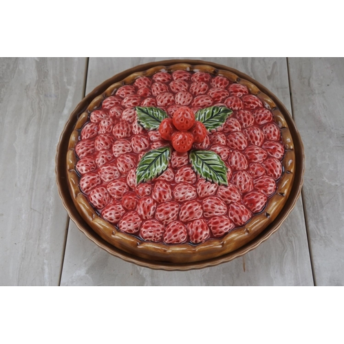 208 - A large vintage Silea pottery lidded dish, decorated with strawberries.