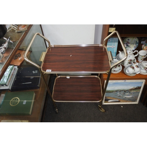 215 - A vintage two tier drinks trolley with removable tray.