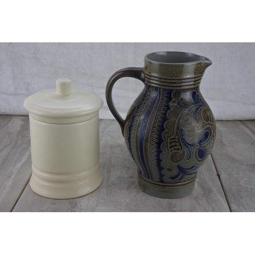 229 - A Krober Alsbach pottery jug and lidded storage jar.