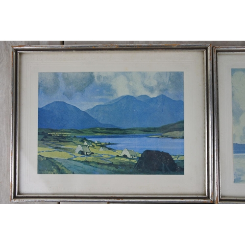 237 - Three framed Paul Henry prints.  Approx 20x16cm.