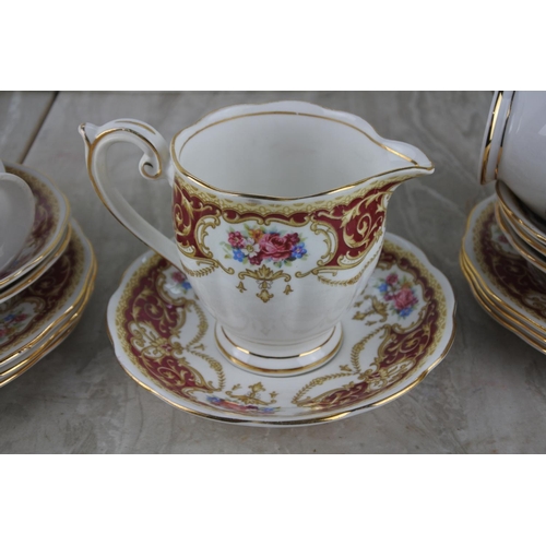 238 - A Queen Anne 'Regency' fine bone china part tea set.