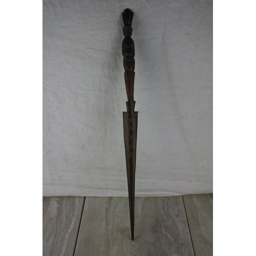 239 - A carved tribal spear.