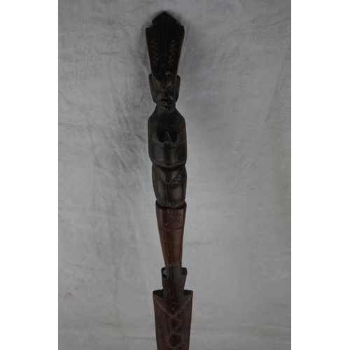 239 - A carved tribal spear.