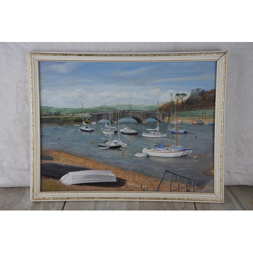 249 - A framed oil on board 'Seaton Harbour' signed J Waine.  Approx 44x34cm.