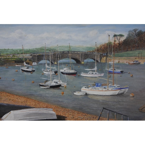 249 - A framed oil on board 'Seaton Harbour' signed J Waine.  Approx 44x34cm.