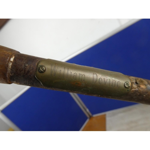 255 - A resin handled walking stick with thistle design and a brass plaque 'William Devine'