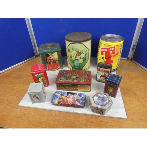 256 - A collection of vintage tins to include Tennents and more.