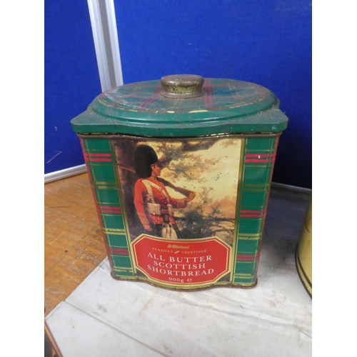 256 - A collection of vintage tins to include Tennents and more.