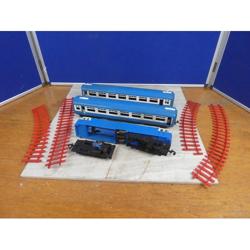 261 - A vintage Blue Liner toy train and some track (a/f)