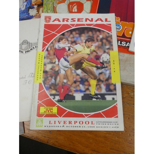 265 - A large collection of vintage football programmes.