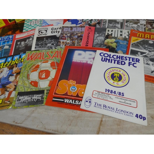 265 - A large collection of vintage football programmes.