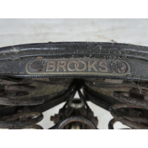 269 - A vintage Brooks bicycle saddle.