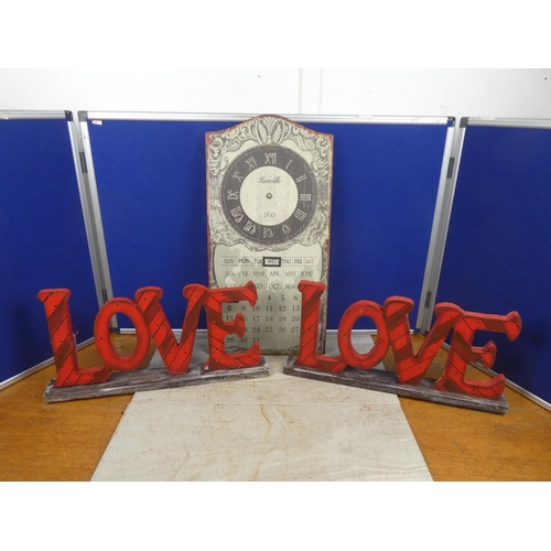 279 - Two wooden illuminated 'Love' signs.  Approx 50x23cm.