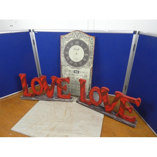 279 - Two wooden illuminated 'Love' signs.  Approx 50x23cm.