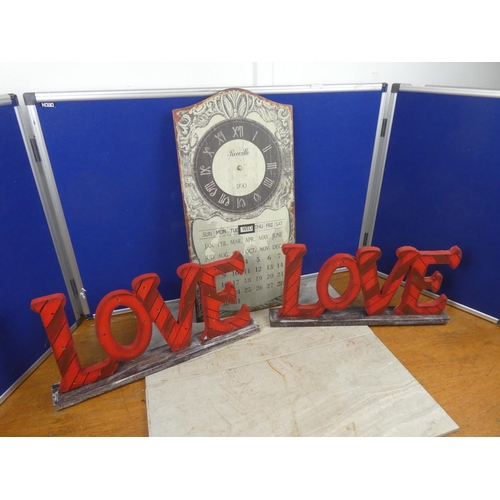 279 - Two wooden illuminated 'Love' signs.  Approx 50x23cm.