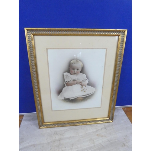 281 - A gilt framed portrait of a child.  Approx 39x46cm.