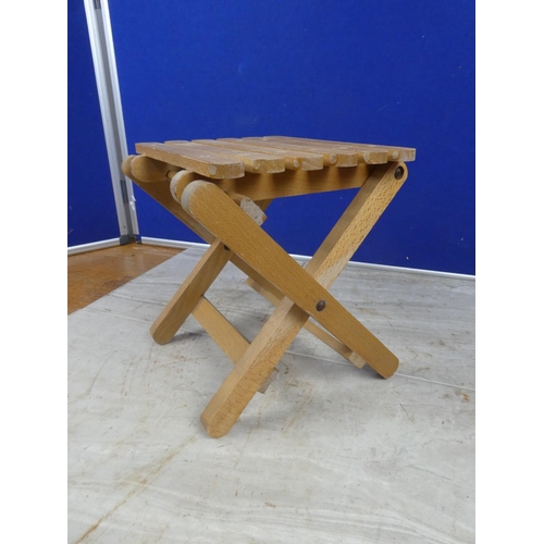 282 - A folding stool.  Approx 25x24x22cm.