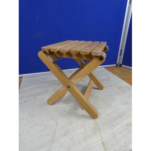 282 - A folding stool.  Approx 25x24x22cm.