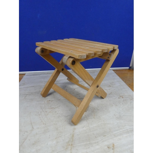 282 - A folding stool.  Approx 25x24x22cm.