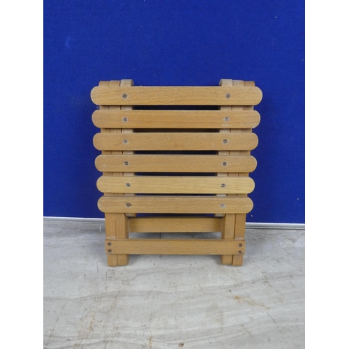 282 - A folding stool.  Approx 25x24x22cm.