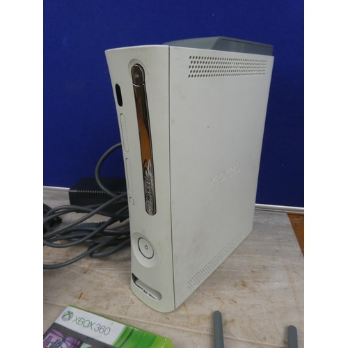 295 - An XBOX 360 console, controllers and accessories.