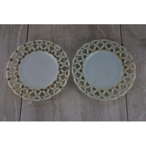 301 - Two antique milk glass plates.