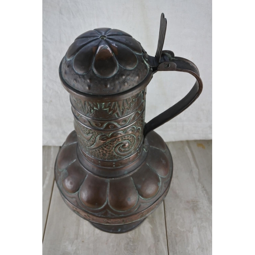 317 - A stunning highly decorative lidded copper urn.  Approx 52cm.