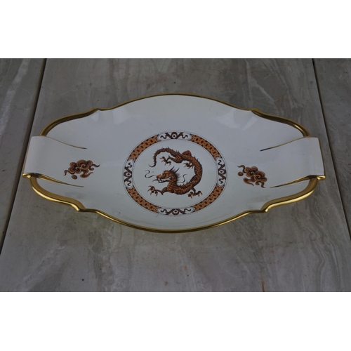 331 - A Cartlon Ware dish with dragon design.