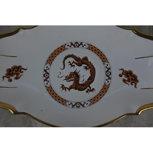 331 - A Cartlon Ware dish with dragon design.