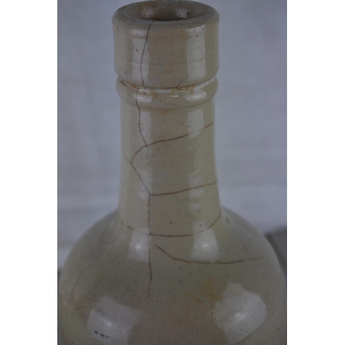 337 - An antique Hawick stoneware bottle.