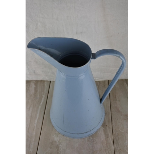 340 - A blue enamel water pail. Approx 40cm.