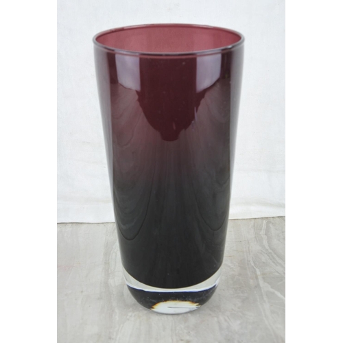 342 - A vintage cranberry glass vase. Approx 25cm.