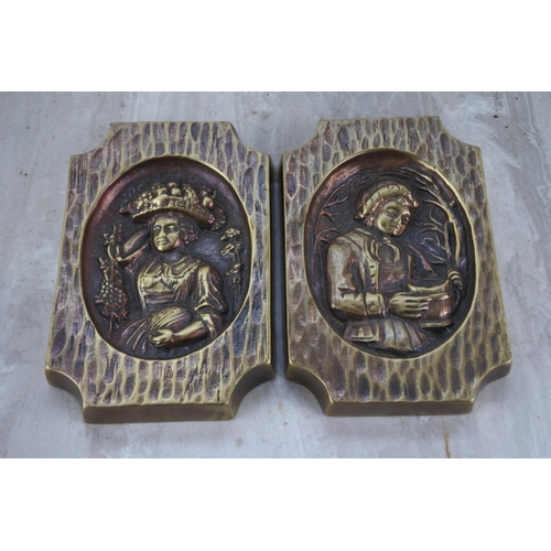 350 - Two brass figurine plaques.