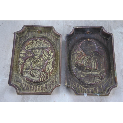 350 - Two brass figurine plaques.