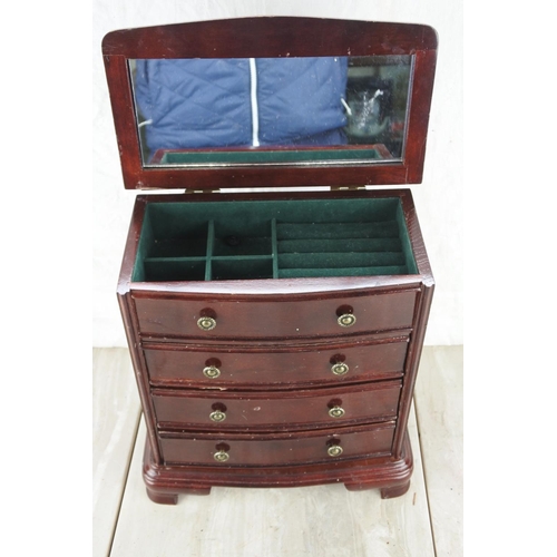 353 - A four drawer jewellery chest. Approx 26x29x15cm.