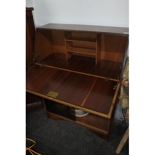 363 - A vintage writing bureau with 4 glass sliding doors. Approx 73x99x30cm.