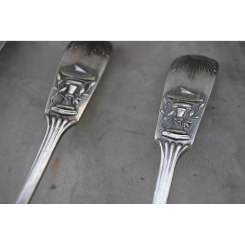 364 - A stunning set of 12 electroplated tea spoons and a pair of sugar nips with a decorative pattern.