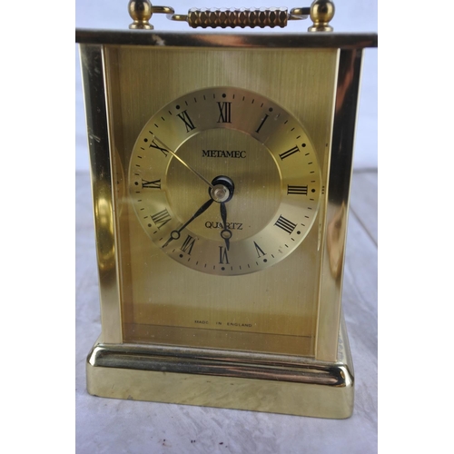 370 - A vintage compact, a brass 'Cat' letter rack, a Metamec quartz clock and two vintage Imperial Nursin... 