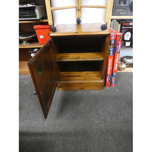 413 - A pine storage cupboard. Approx 51x60x45cm.