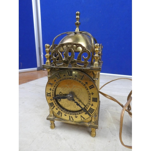 432 - An electric brass carriage clock.