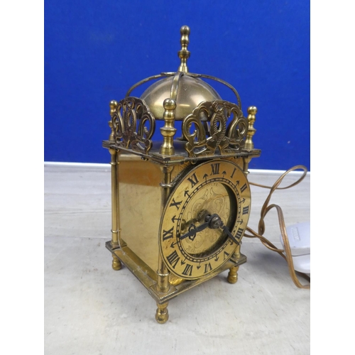 432 - An electric brass carriage clock.