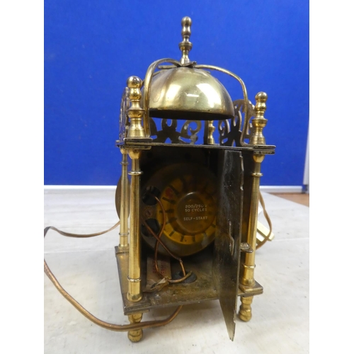 432 - An electric brass carriage clock.